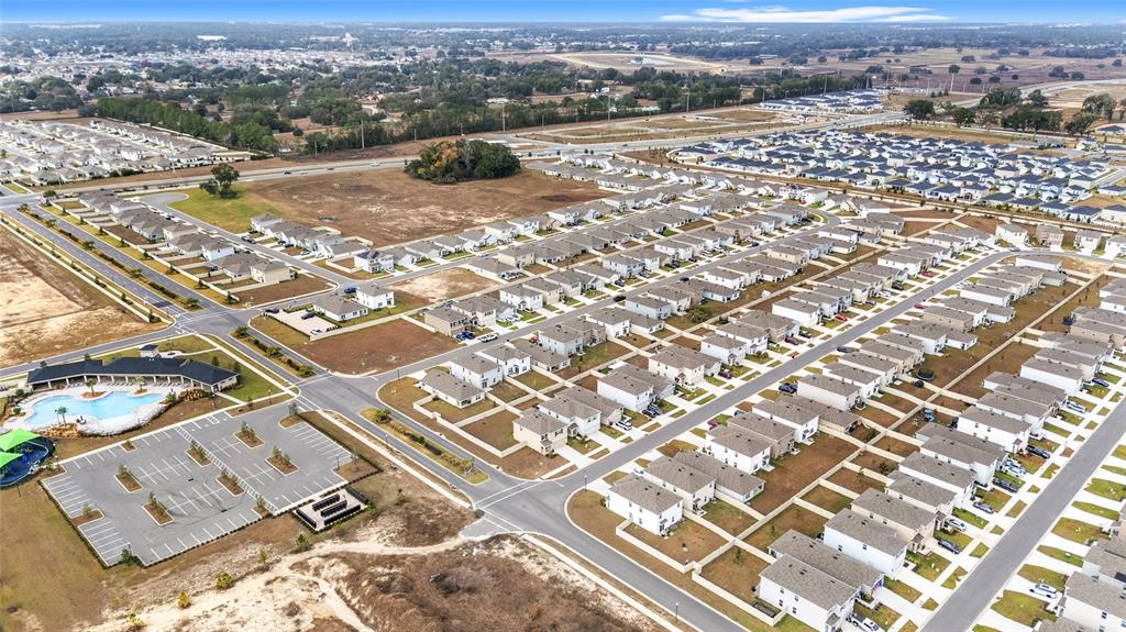 8696 Southwest 46th Avenue Ocala, FL 34476 - Photo 45 of 51 an aerial view of residential houses with outdoor space