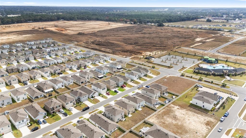 8696 Southwest 46th Avenue Ocala, FL 34476 - Photo 50 of 51 an aerial view of residential houses with outdoor space