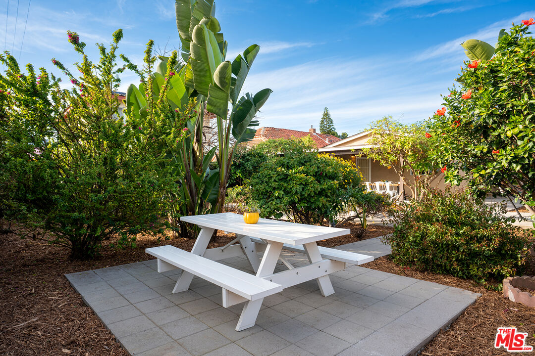 4014 Baywood Street Los Angeles, CA 90039 - Photo 24 of 25 a view of a patio with table and chairs and potted plants
