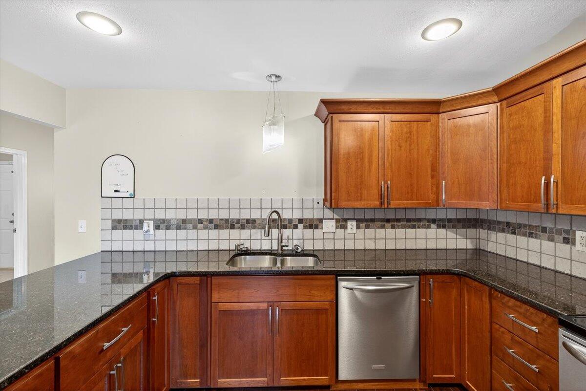 608 Northview Drive Crestview, FL 32536 - Photo 14 of 39 a kitchen with stainless steel appliances a sink stove and cabinets
