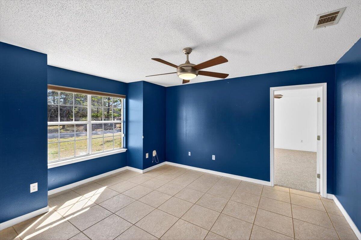 608 Northview Drive Crestview, FL 32536 - Photo 17 of 39 a view of an empty room with a window