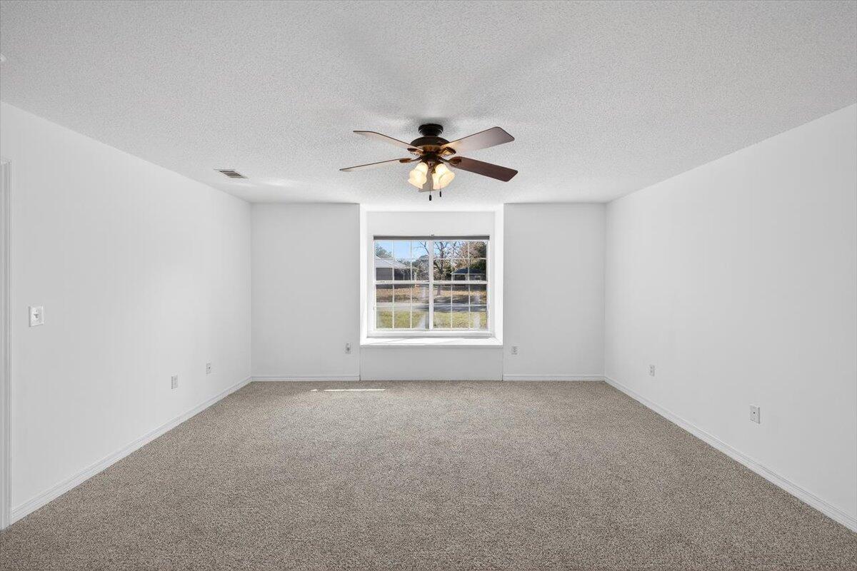 608 Northview Drive Crestview, FL 32536 - Photo 21 of 39 a view of an empty room with a window