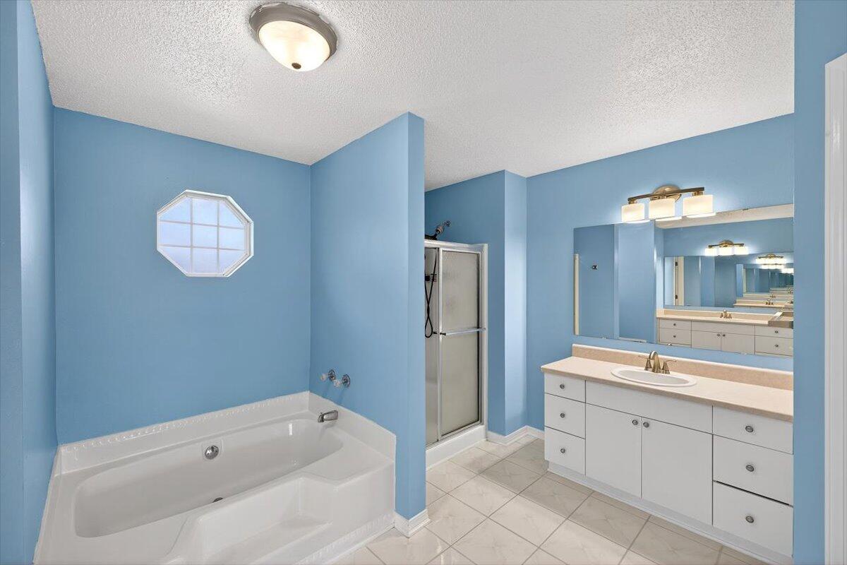 608 Northview Drive Crestview, FL 32536 - Photo 25 of 39 a spacious bathroom with a tub sink and mirror