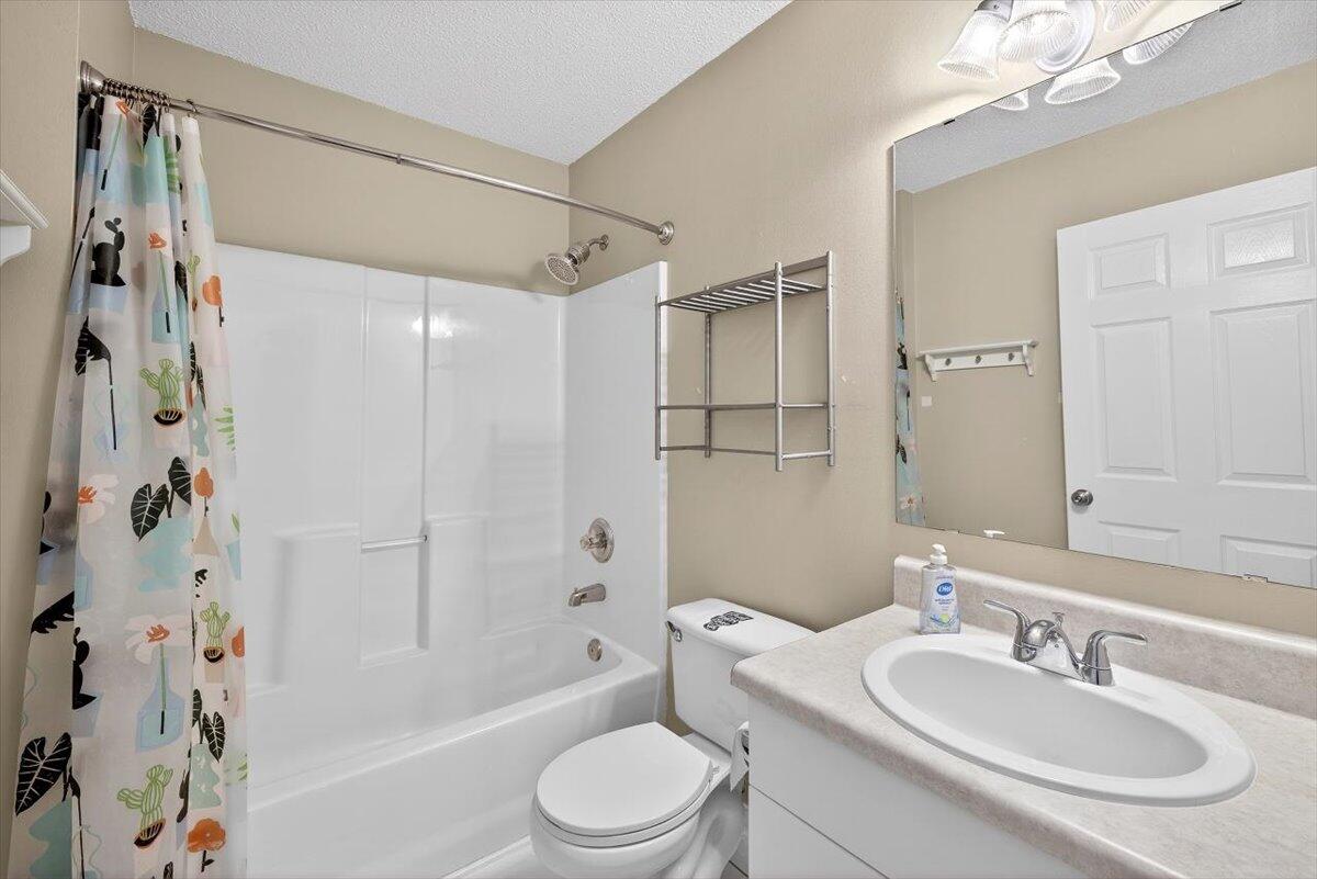 608 Northview Drive Crestview, FL 32536 - Photo 33 of 39 a bathroom with a sink a toilet and shower