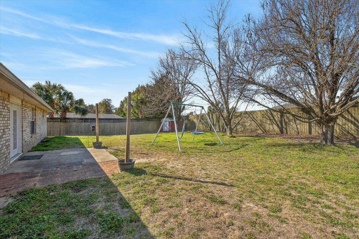 608 Northview Drive Crestview, FL 32536 - Photo 35 of 39 a view of a backyard with fence