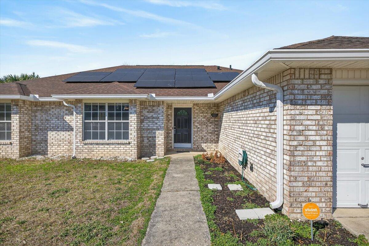 608 Northview Drive Crestview, FL 32536 - Photo 5 of 39 a front view of a house with a yard
