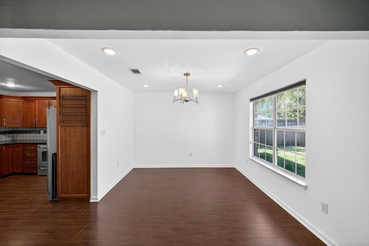 608 Northview Drive Crestview, FL 32536 - Photo 10 of 39 a view of a livingroom with wooden floor