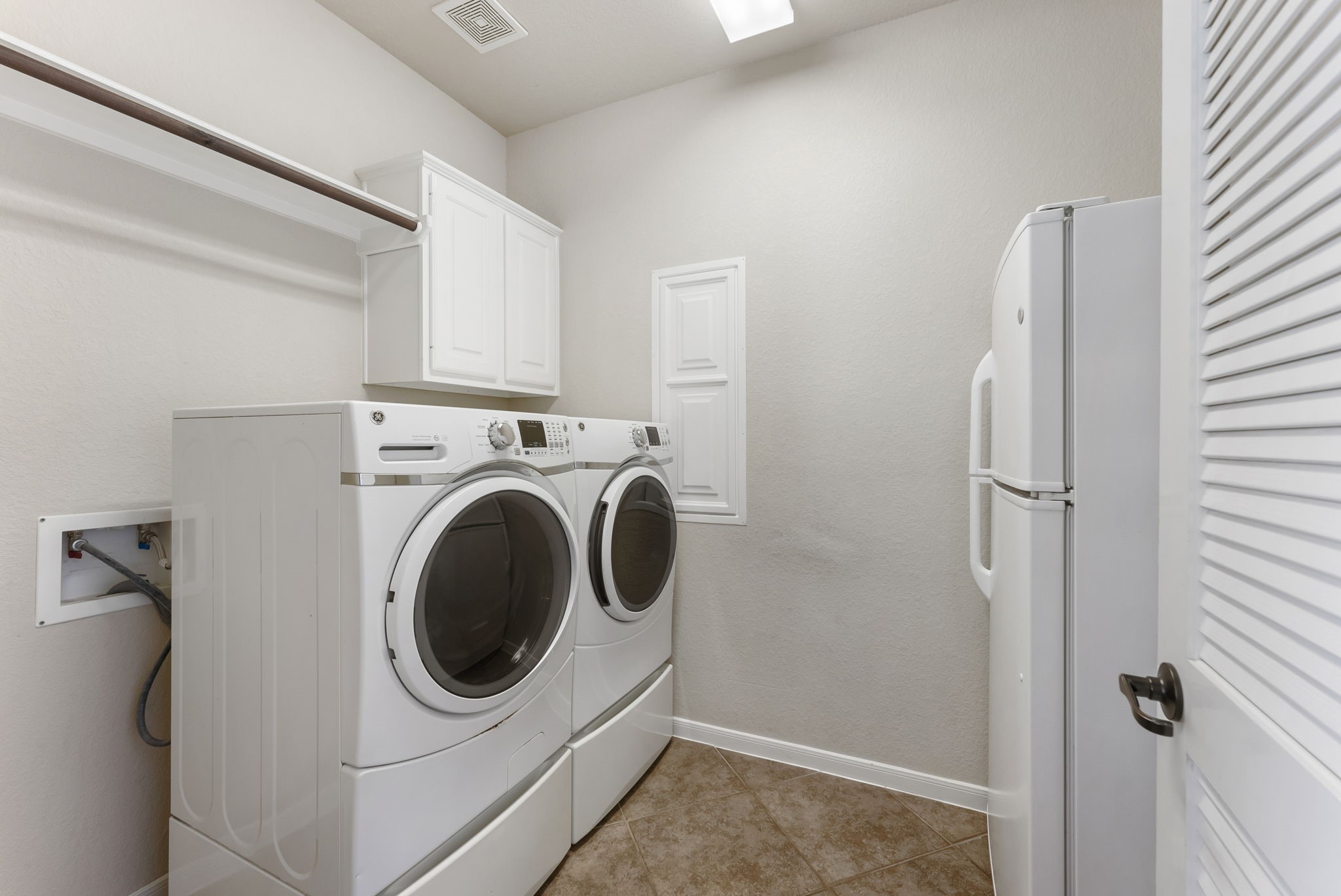 19223 Senterra Lakes Boulevard Spring, TX 77379 - Photo 35 of 48 a utility room with dryer and washer
