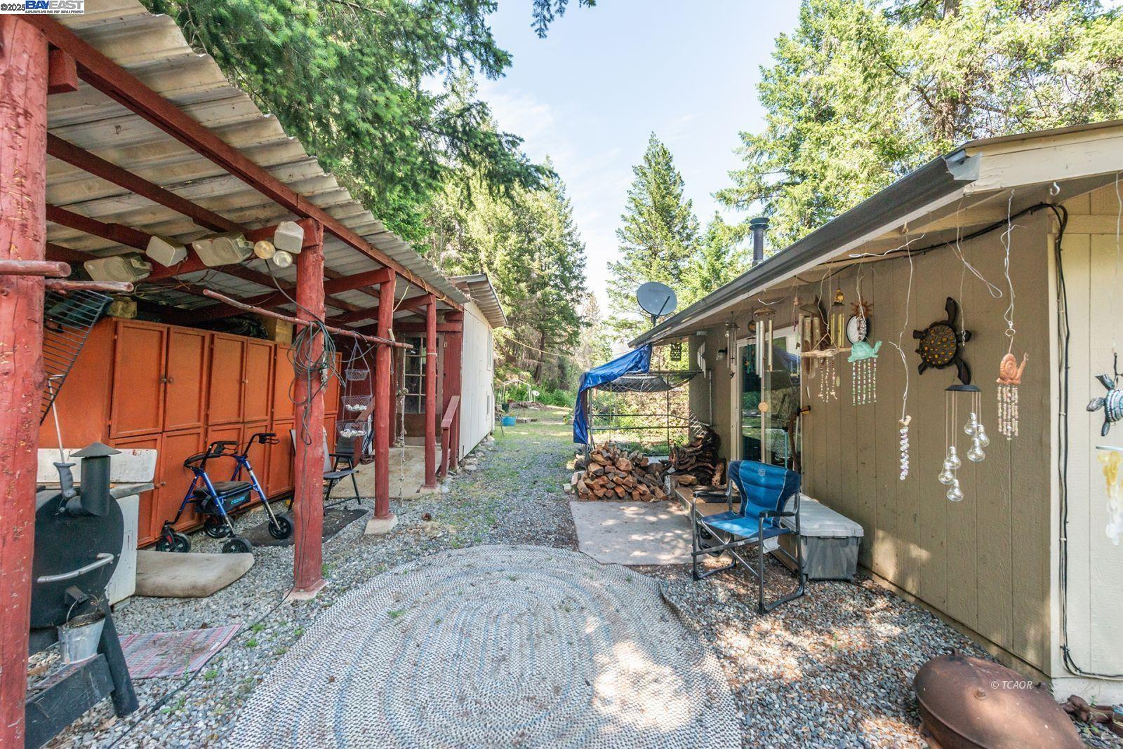 2940 Dutch Creek Road Junction City, CA 96048 - Photo 26 of 47 a view of a wooden house with a yard