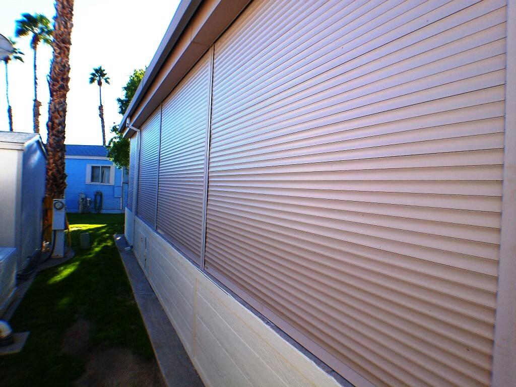 84136 Ave 44, Unit 408 Indio, CA 92203 - Photo 15 of 44 a house view with a backyard space