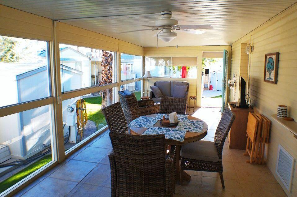 84136 Ave 44, Unit 408 Indio, CA 92203 - Photo 21 of 44 a view of a dining room with furniture window and outside view