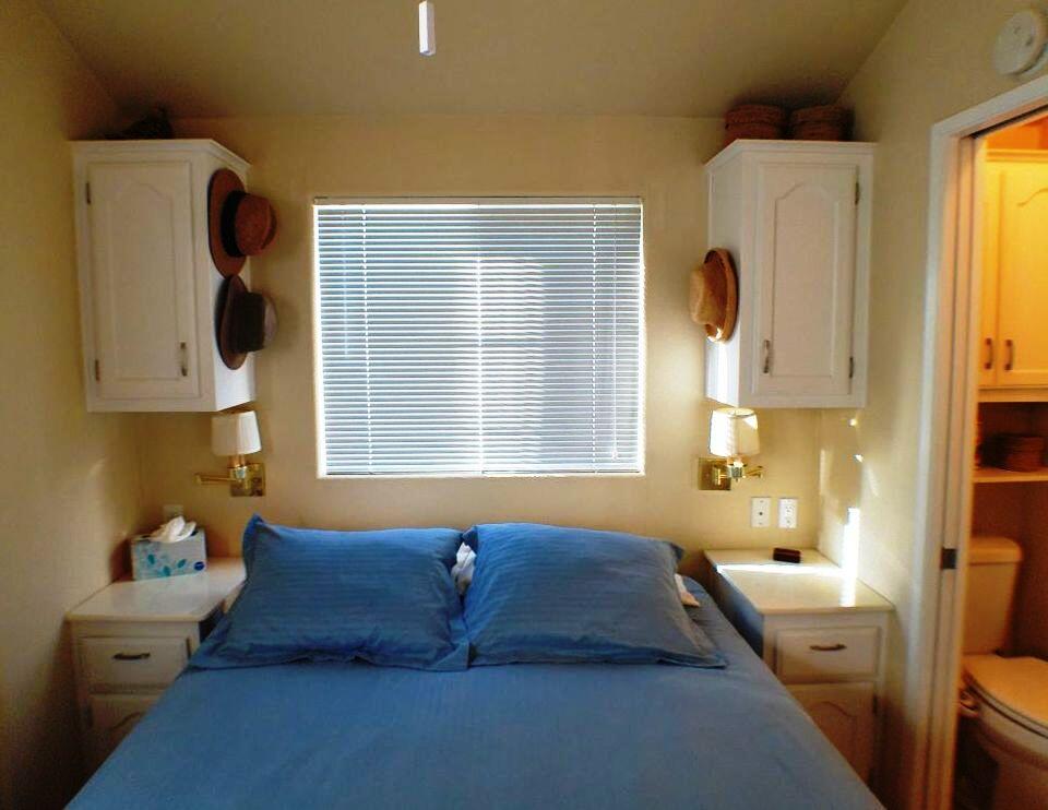 84136 Ave 44, Unit 408 Indio, CA 92203 - Photo 41 of 44 a bathroom with a bathtub sink and a window