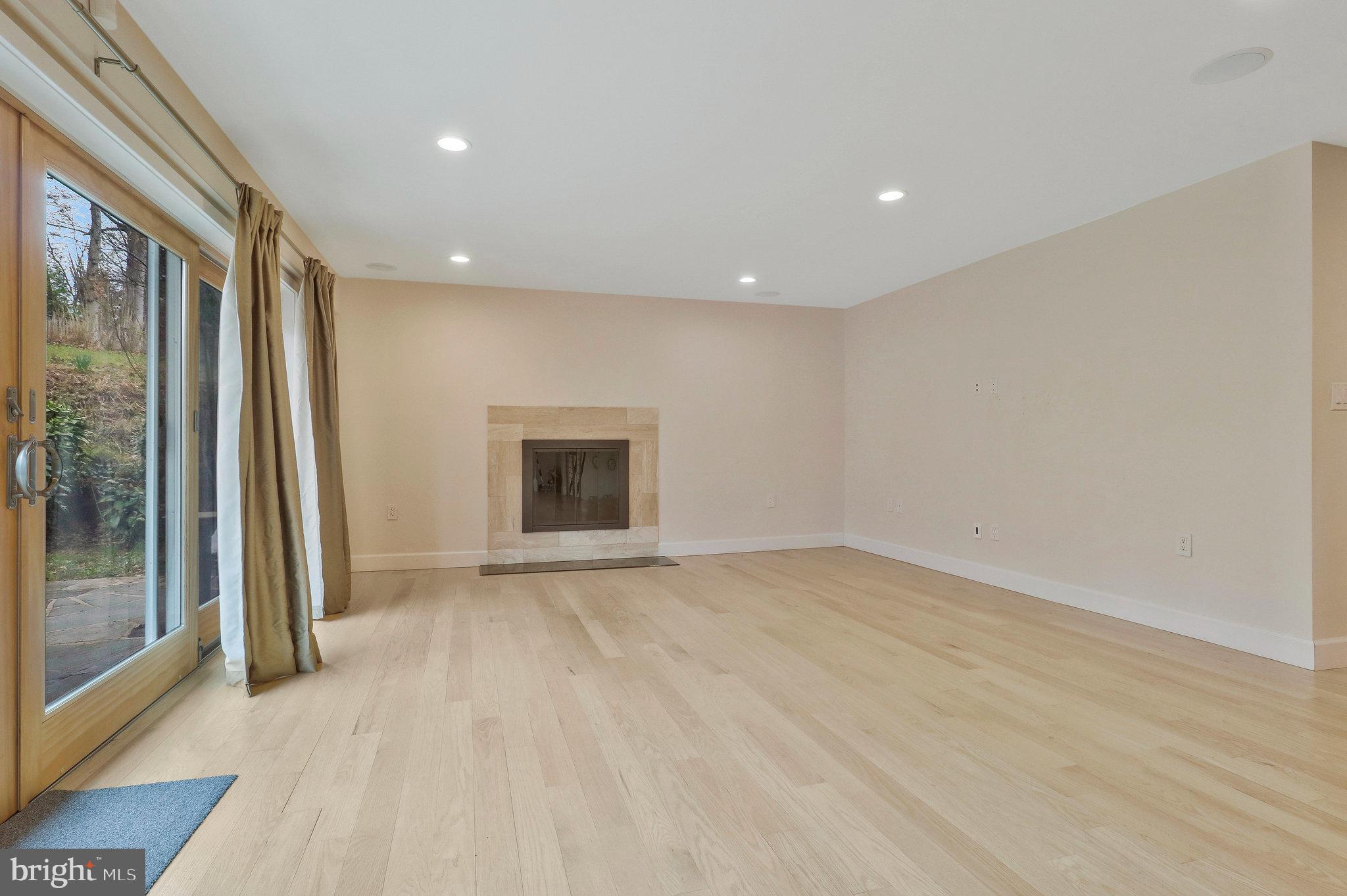8543 Howell Road Bethesda, MD 20817 - Photo 12 of 24 a view of an empty room with a window