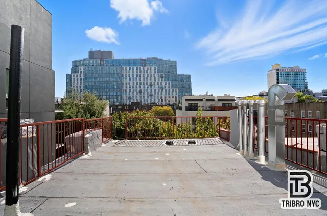 a view of a city with tall buildings