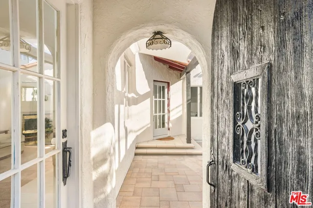 a view of a entryway door front of a house