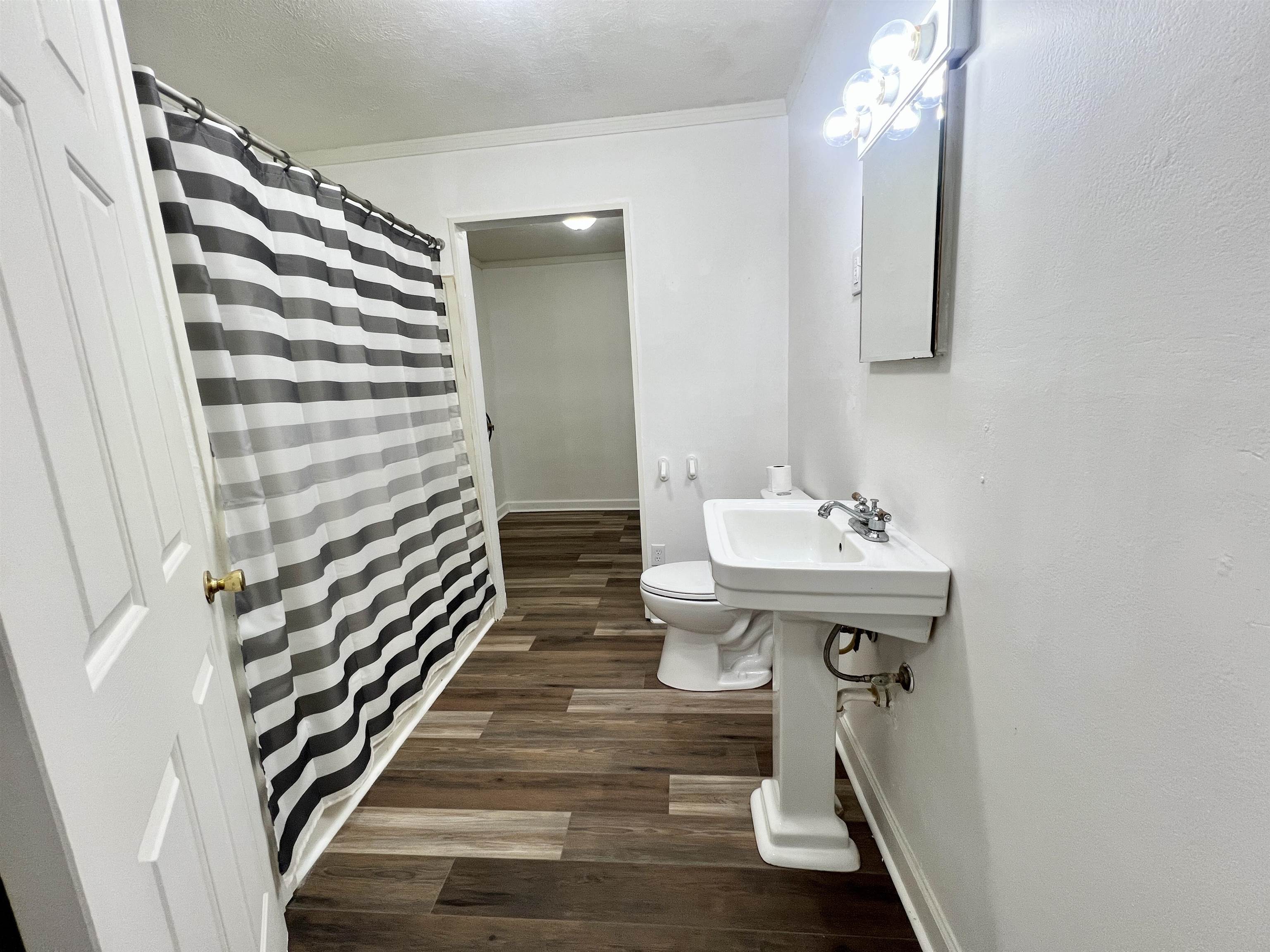 250 Ranch Street Savannah, TN 38372 - Photo 11 of 29 a bathroom with a sink and mirror