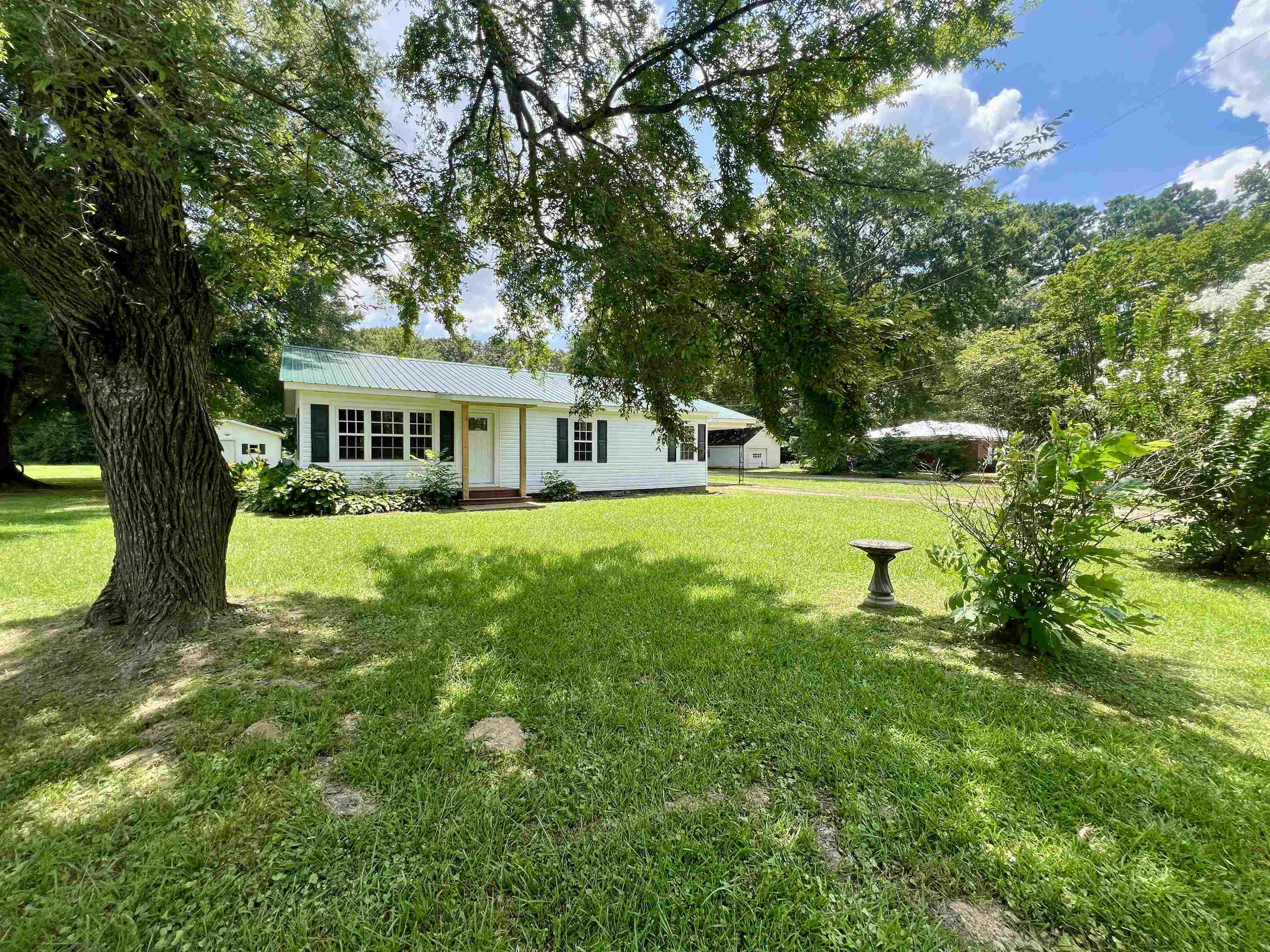 250 Ranch Street Savannah, TN 38372 - Photo 18 of 29 a view of a house with a big yard