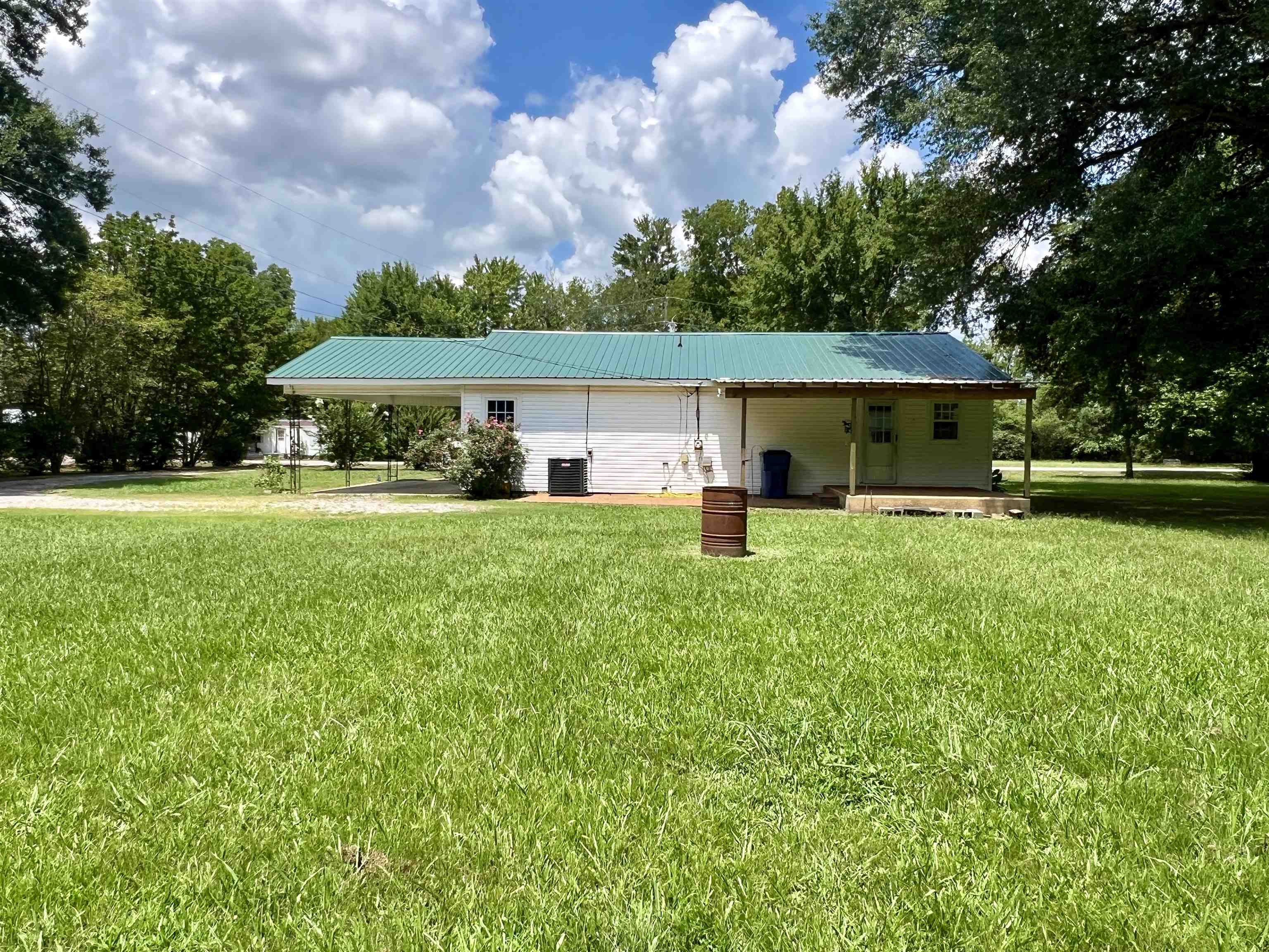 250 Ranch Street Savannah, TN 38372 - Photo 19 of 29 a front view of a house with a yard