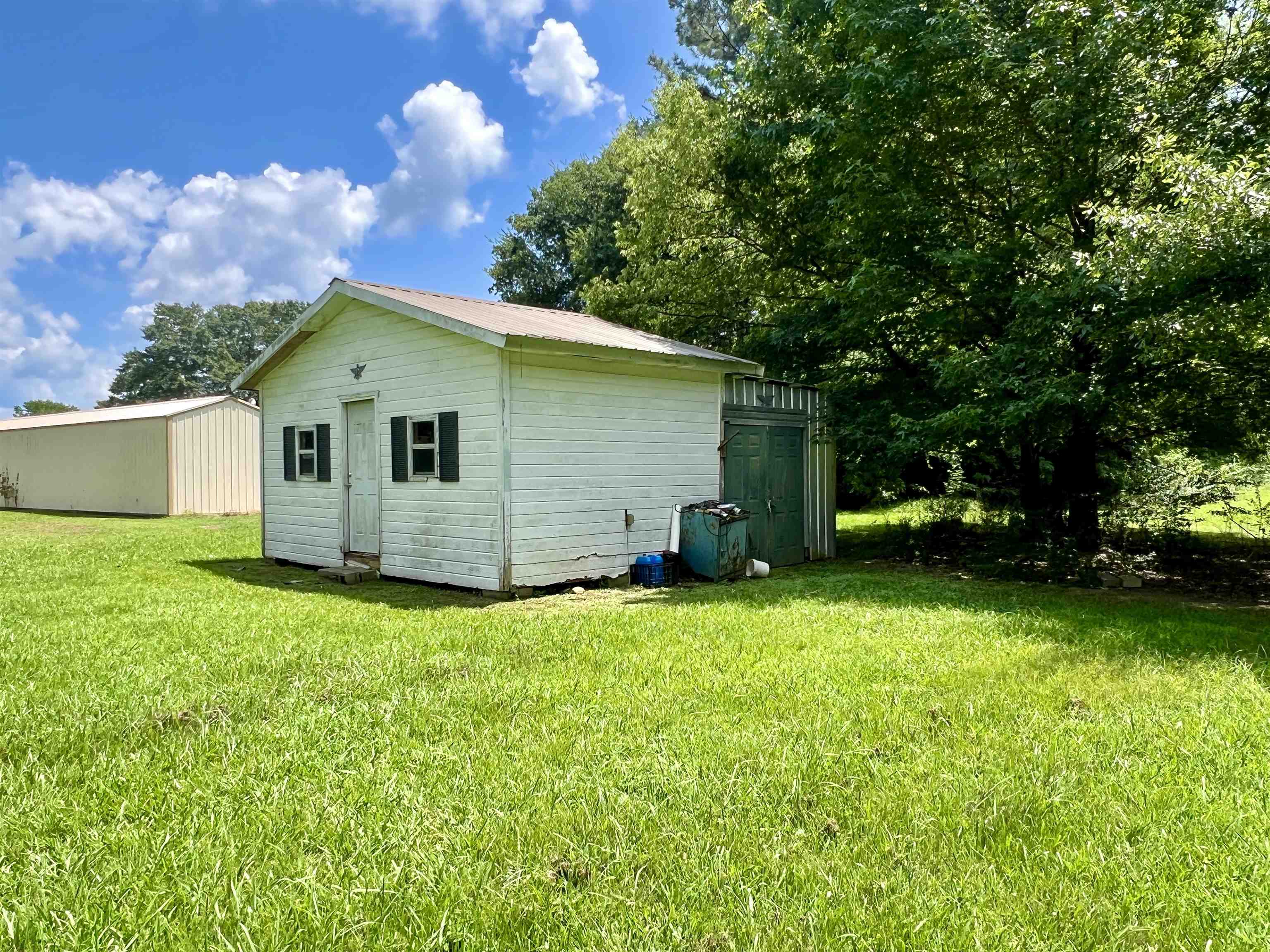 250 Ranch Street Savannah, TN 38372 - Photo 20 of 29 a view of a house with backyard
