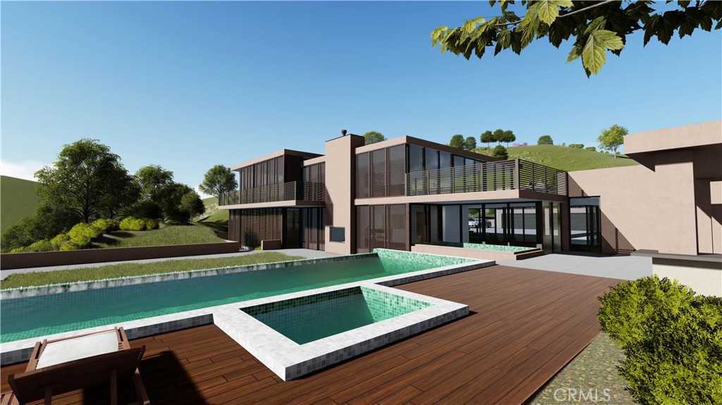 3111 Old Topanga Canyon Road Calabasas, CA 91302 - Photo 5 of 5 a view of a house with a big yard and large trees