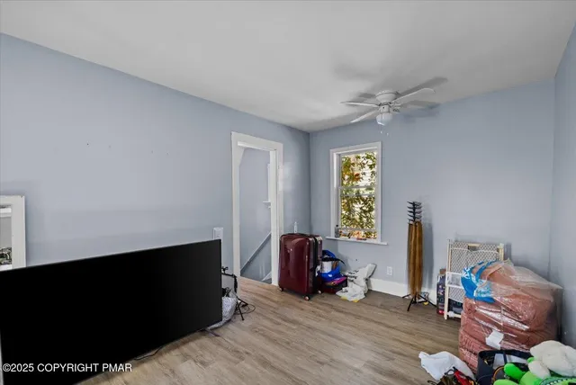 a kitchen with stainless steel appliances a sink a stove and cabinets