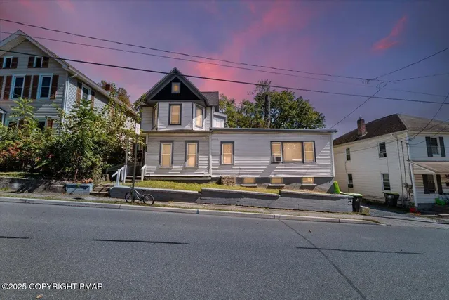a house view with a street
