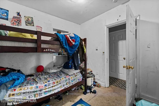a kitchen with a refrigerator and washer