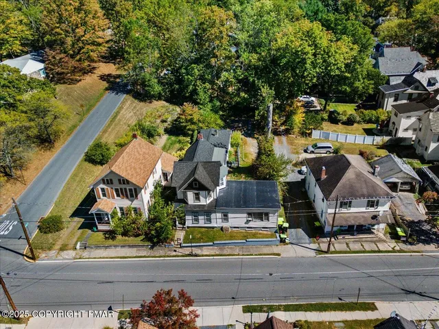 an aerial view of multiple houses