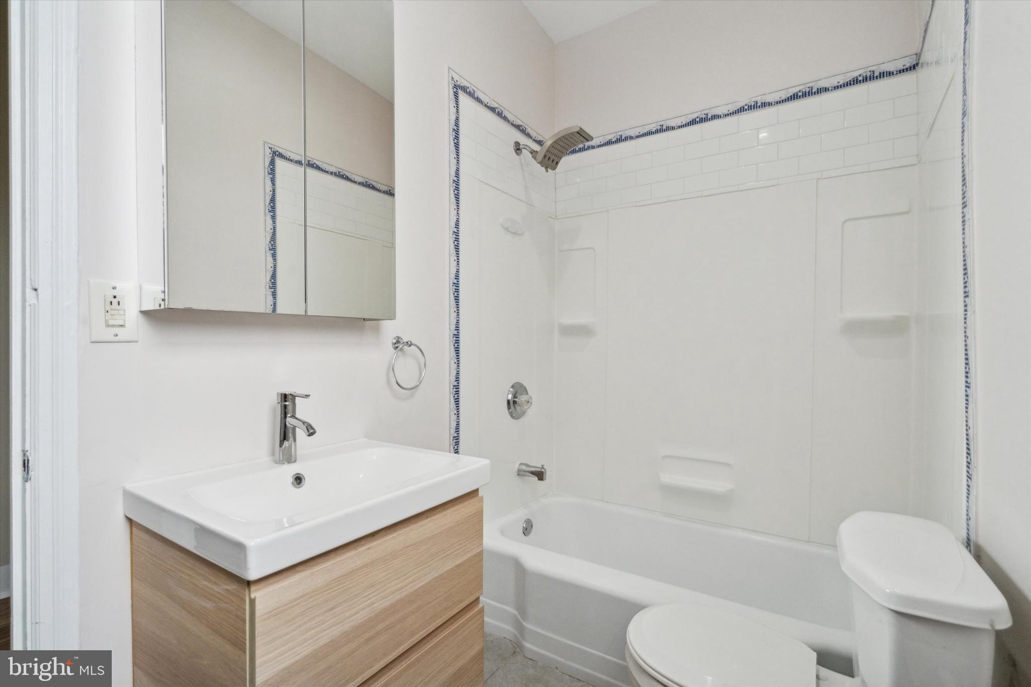 711 Reed Street Philadelphia, PA 19147 - Photo 26 of 32 a bathroom with a sink toilet and shower