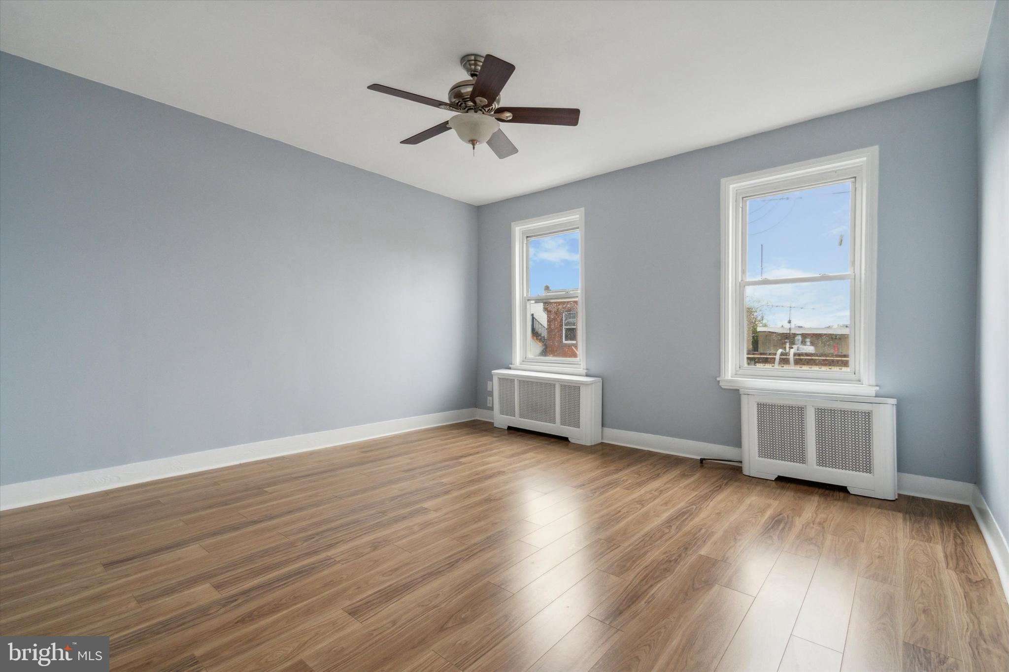 711 Reed Street Philadelphia, PA 19147 - Photo 29 of 32 a view of room with hardwood floor and ceiling fan