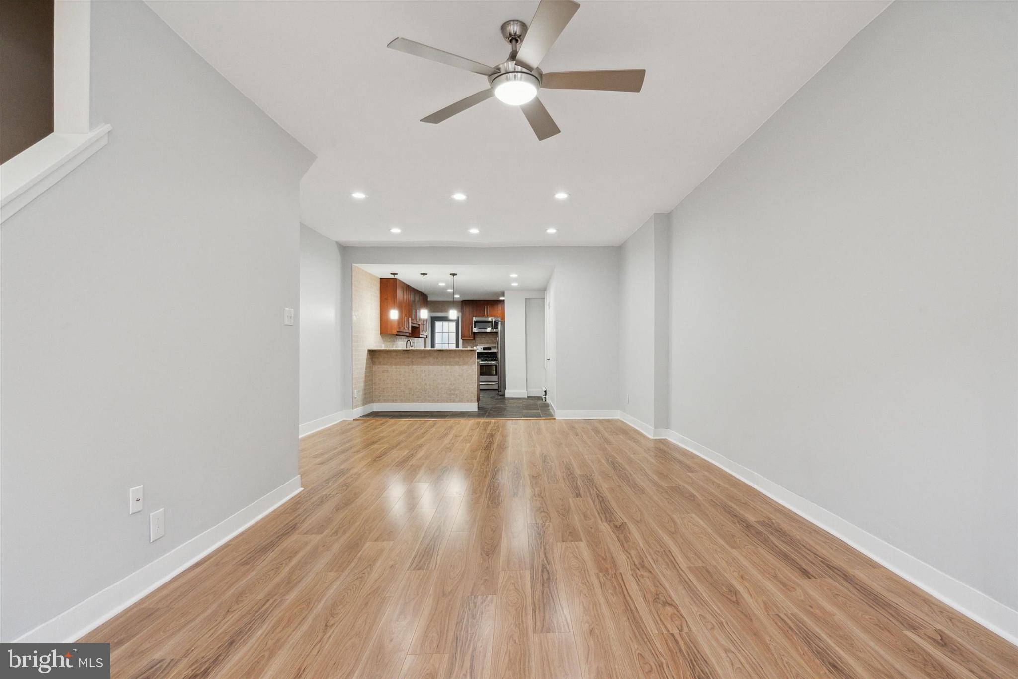 711 Reed Street Philadelphia, PA 19147 - Photo 3 of 32 wooden floor in an empty room with a window