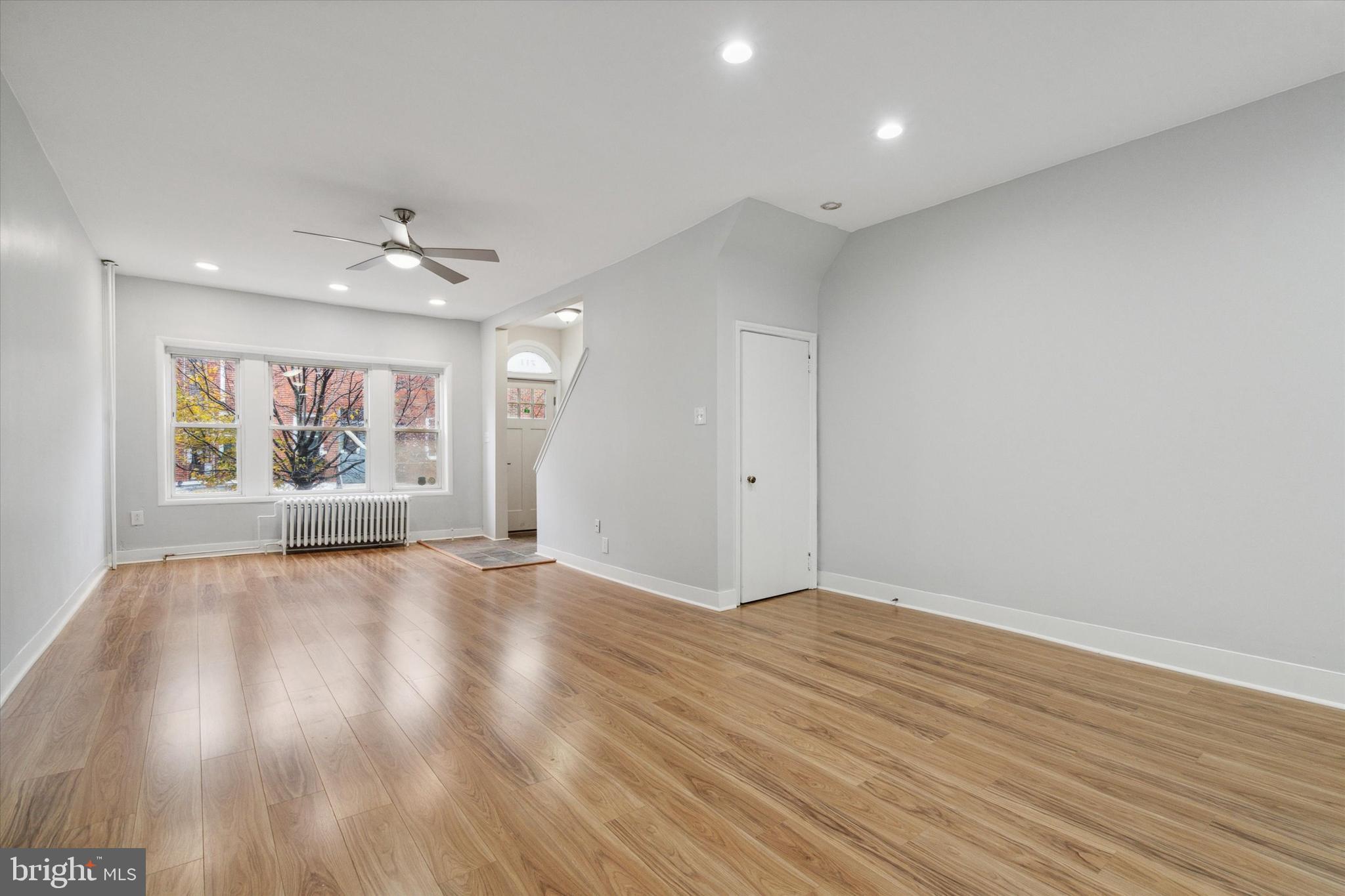 711 Reed Street Philadelphia, PA 19147 - Photo 7 of 32 wooden floor in an empty room with a window