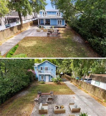 an aerial view of a house with swimming pool garden and patio