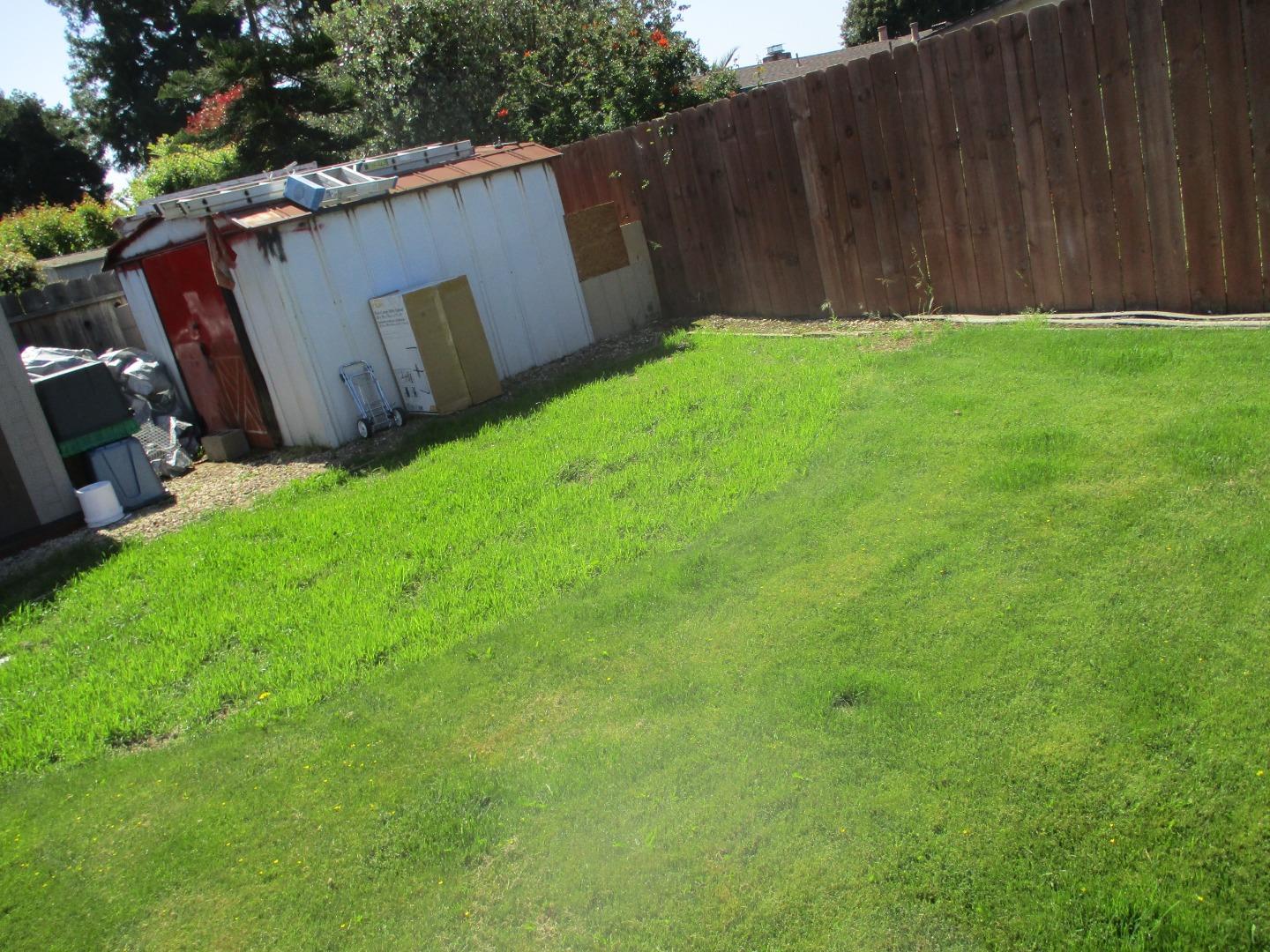 467 Tuttle Avenue Watsonville, CA 95076 - Photo 3 of 7 a view of a backyard