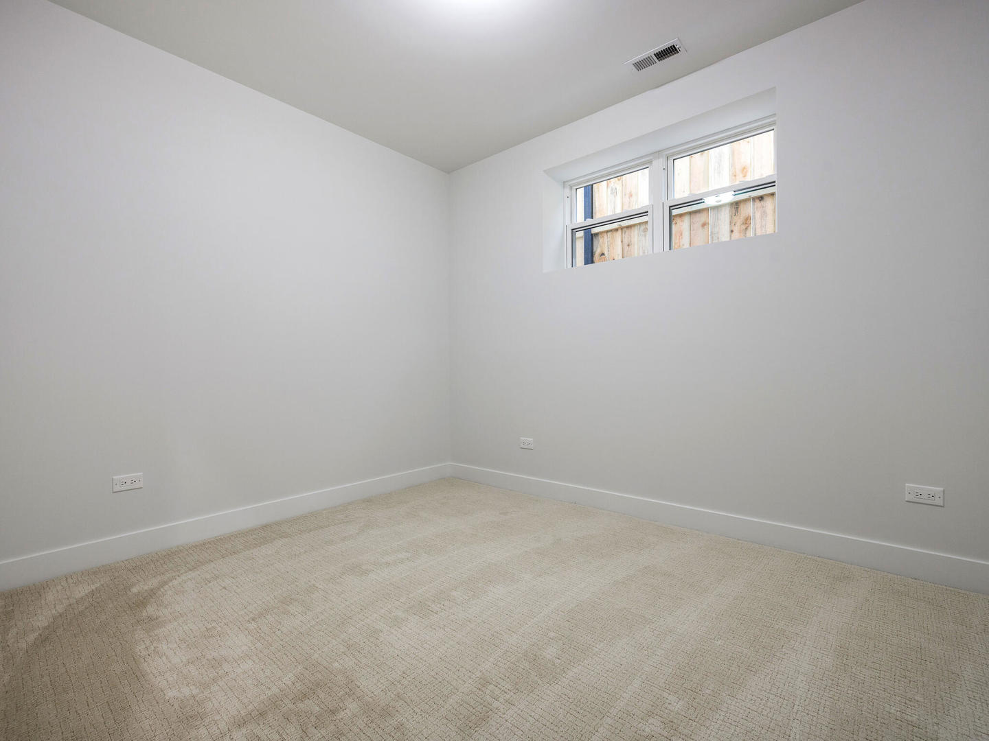 Undisclosed Address Chicago, IL 60618 - Photo 23 of 28 an empty room with windows