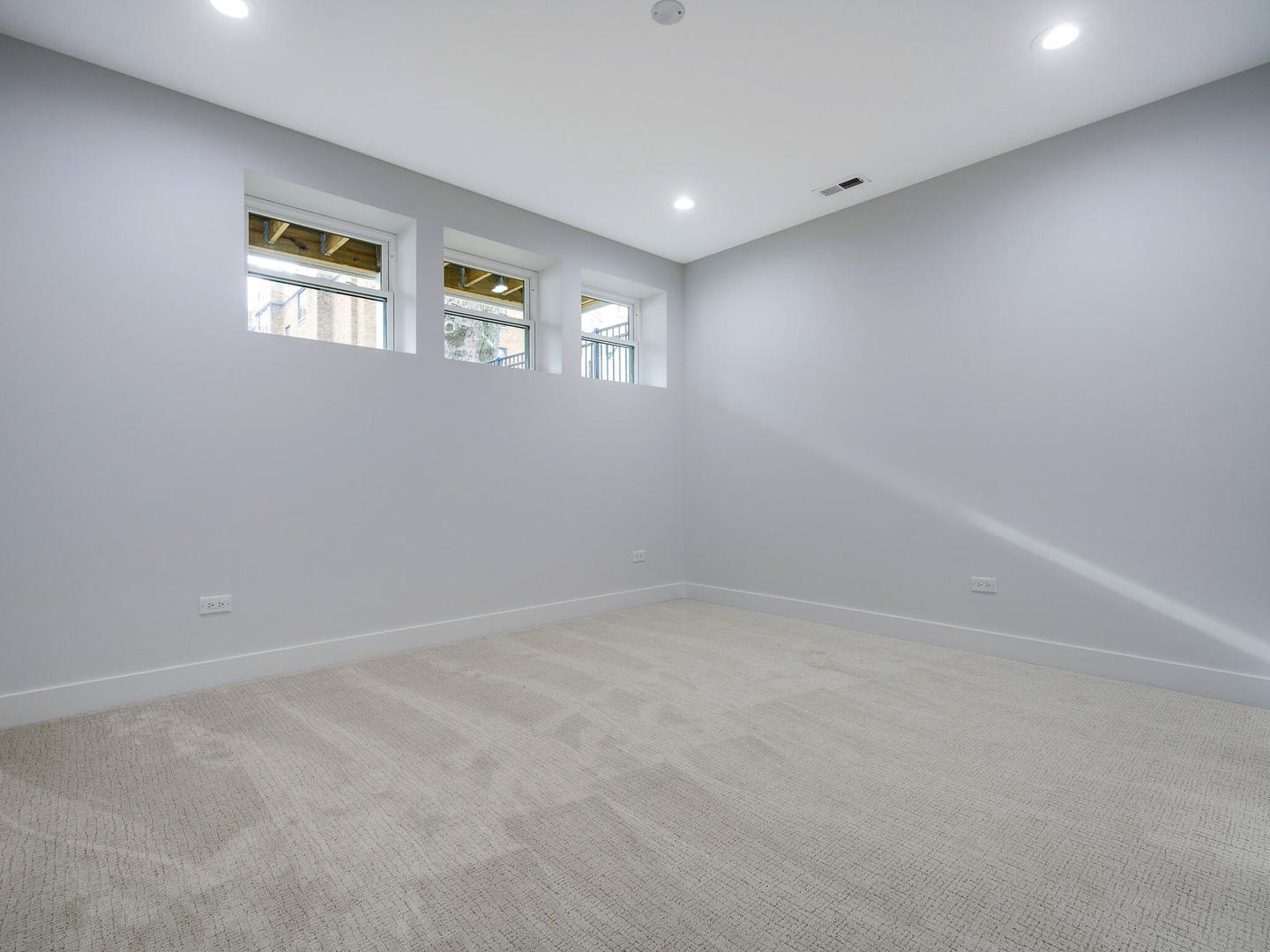 Undisclosed Address Chicago, IL 60618 - Photo 25 of 28 a view of an empty room with a window