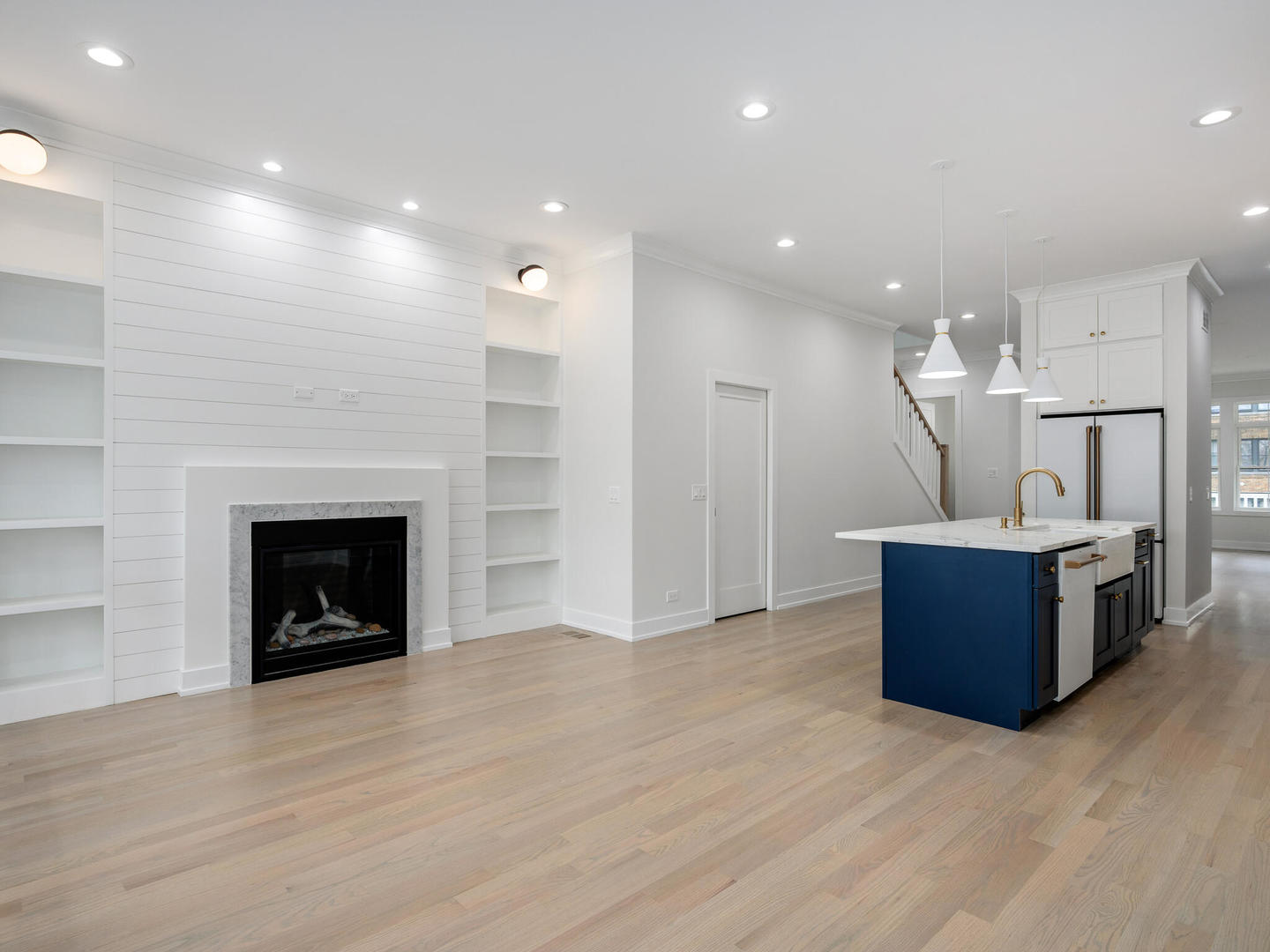 Undisclosed Address Chicago, IL 60618 - Photo 10 of 28 a view of a kitchen with a sink and a fireplace