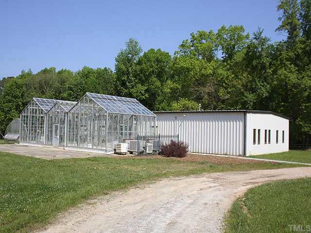 1059 Grayson Road Creedmoor, NC 27522 - Photo 11 of 12 One of the Heated & Cooled Commercial Buildings with Offices, Warehouse, Kitchenette, Conference Room & Baths. The Custom Greenhouse is Climate Controlled for the Serious Gardener!