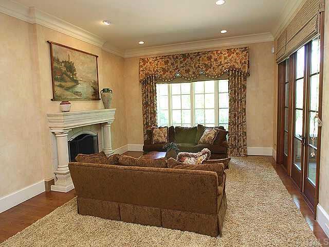 1059 Grayson Road Creedmoor, NC 27522 - Photo 3 of 12 Keeping Room with Fireplace opens to Kitchen & Breakfast Area and has access to Covered Porch.