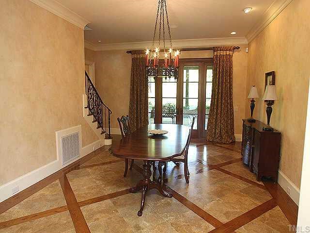 1059 Grayson Road Creedmoor, NC 27522 - Photo 4 of 12 Formal Dining with Custom Tile & Hardwood Floor is Ideal for Entertaining.