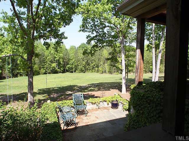 1059 Grayson Road Creedmoor, NC 27522 - Photo 10 of 12 Enjoy Nature at it's Best from your Private Patio surrounded by Tall Oaks, Towering Pines, Trails, & Open Fields!
