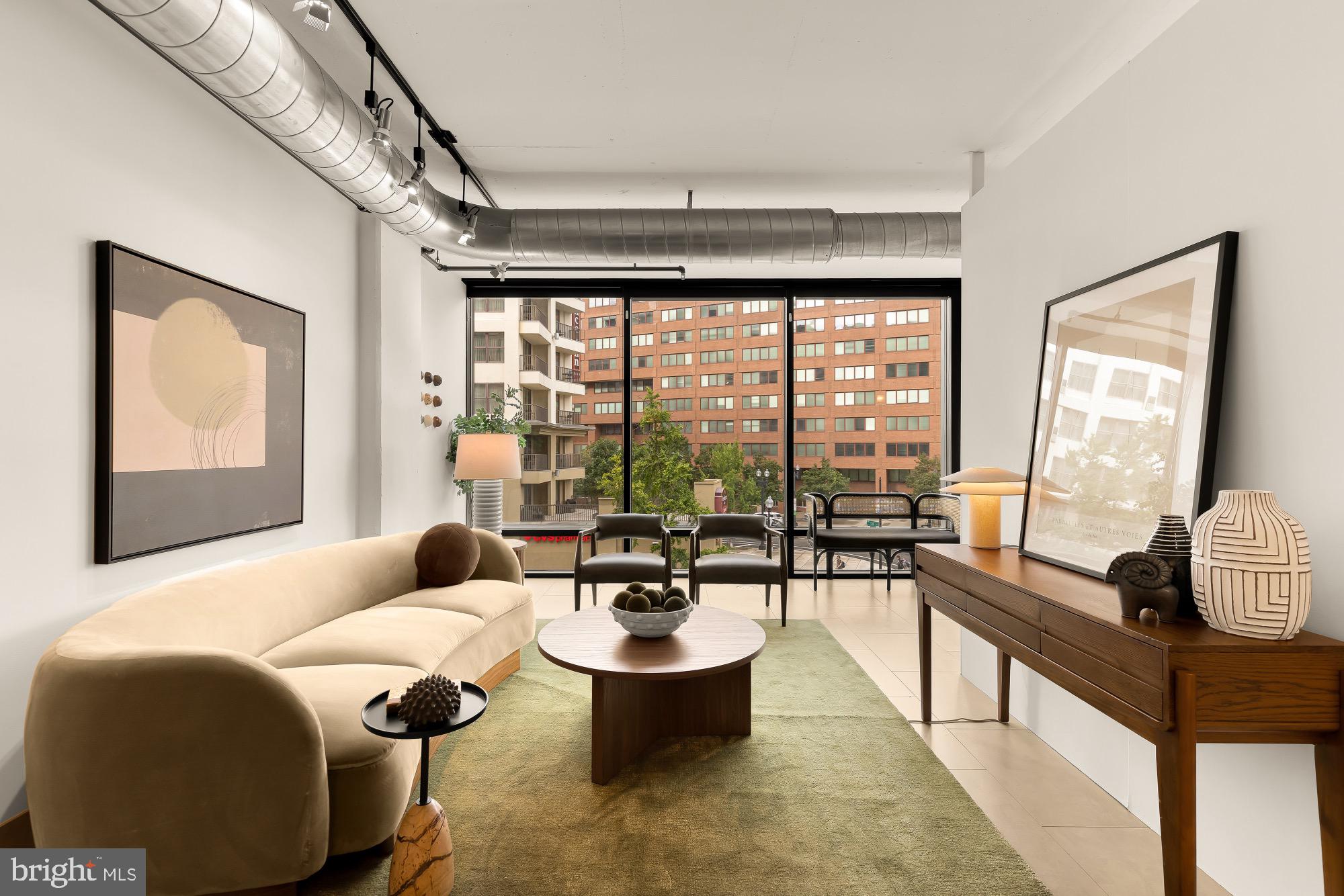 1133 14th Street Northwest, Unit 308 Washington, DC 20005 - Photo 2 of 34 Modern urban oasis with vibrant views.