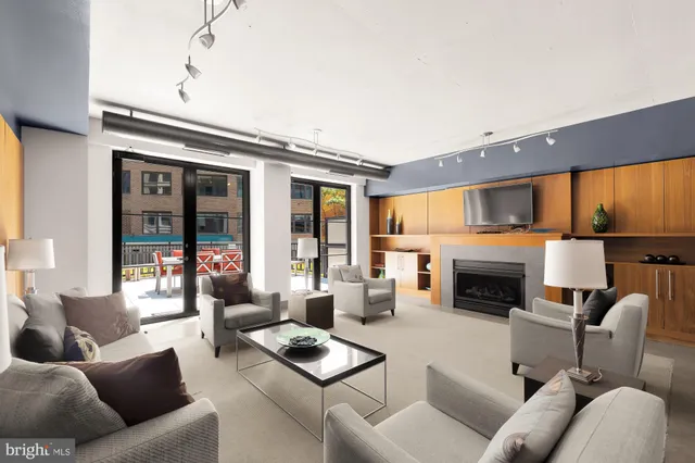 a living room with furniture or fireplace and a flat screen tv