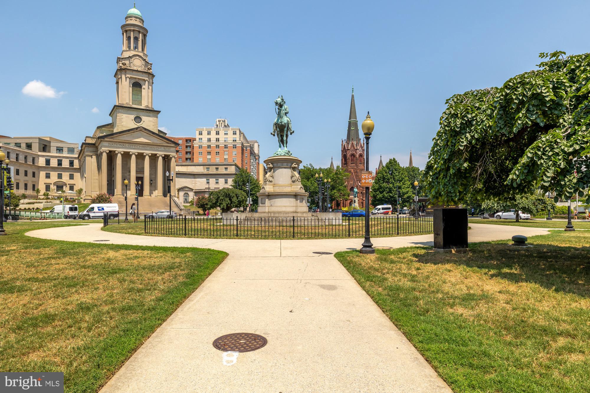 1133 14th Street Northwest, Unit 308 Washington, DC 20005 - Photo 34 of 34 Historic square with vibrant city backdrop.