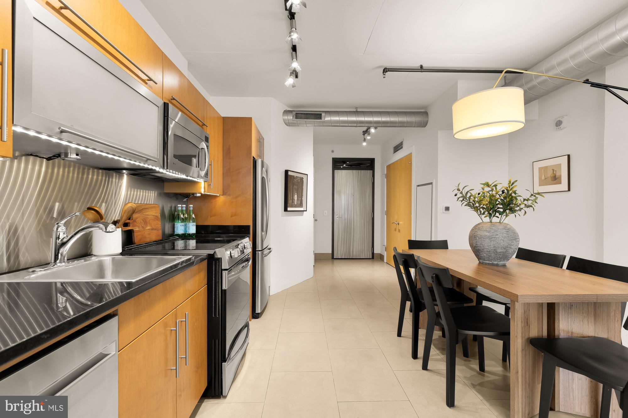 1133 14th Street Northwest, Unit 308 Washington, DC 20005 - Photo 8 of 34 Modern kitchen with sleek design elements.