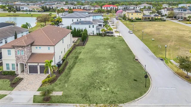 a aerial view of a house with a swimming pool