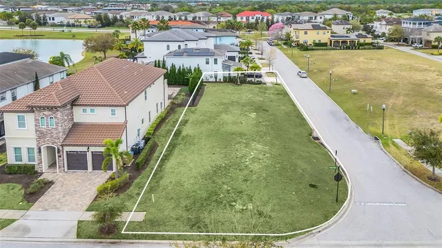 a aerial view of a house with a swimming pool