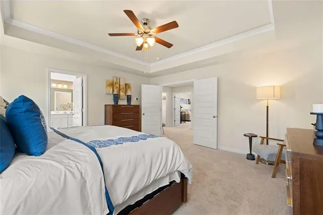 a bedroom with a bed and a cabinets