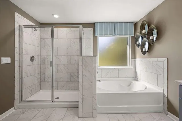 a view of a house next to a big yard