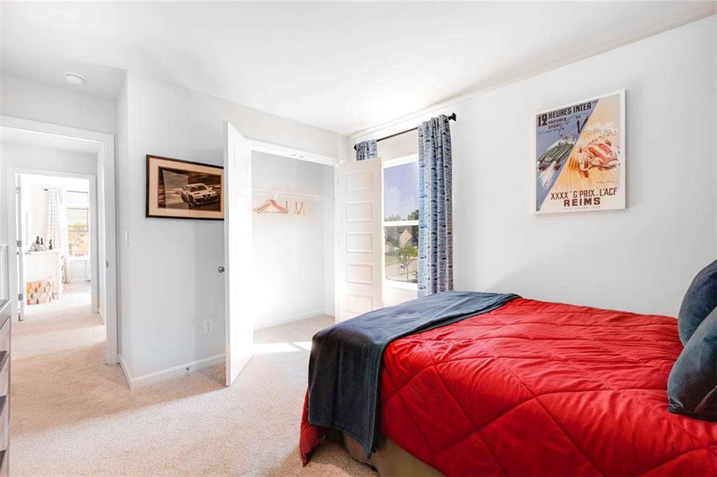 13632 Whitman Lane Covington, GA 30014 - Photo 45 of 53 a bedroom with a bed and painting on the wall